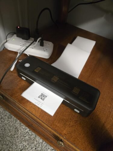 Portable Printer Wireless for Travel. Inkless Thermal Printer Supports 8.5 x 11 Inch Thermal Paper. Bluetooth Compatible with iOS. Android. Laptop Includes 2 Rolls & 10 Sheets of Paper Kit photo review
